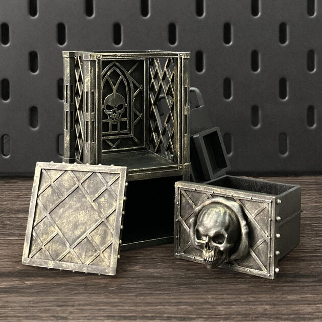 The Skull | Wall-Mounted TTRPG Organizer & Dice Drawer Hand-painted weathered iron skull dice box with open storage drawer, mounted on an IKEA SKÅDIS pegboard for TTRPG miniature display.
