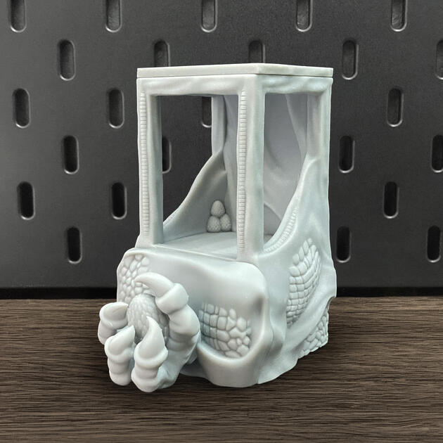 The Talon | Wall-Mounted TTRPG Organizer & Dice Drawer Hand-painted ancient stone dragon claw dice box with open storage drawer, mounted on an IKEA SKÅDIS pegboard for TTRPG setup.