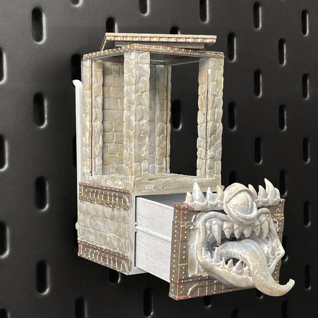 The Mimic | Wall-Mounted TTRPG Organizer & Dice Drawer Hand-painted stone texture Mimic dice box with open storage drawer, mounted on an IKEA SKÅDIS pegboard as a TTRPG miniature display.